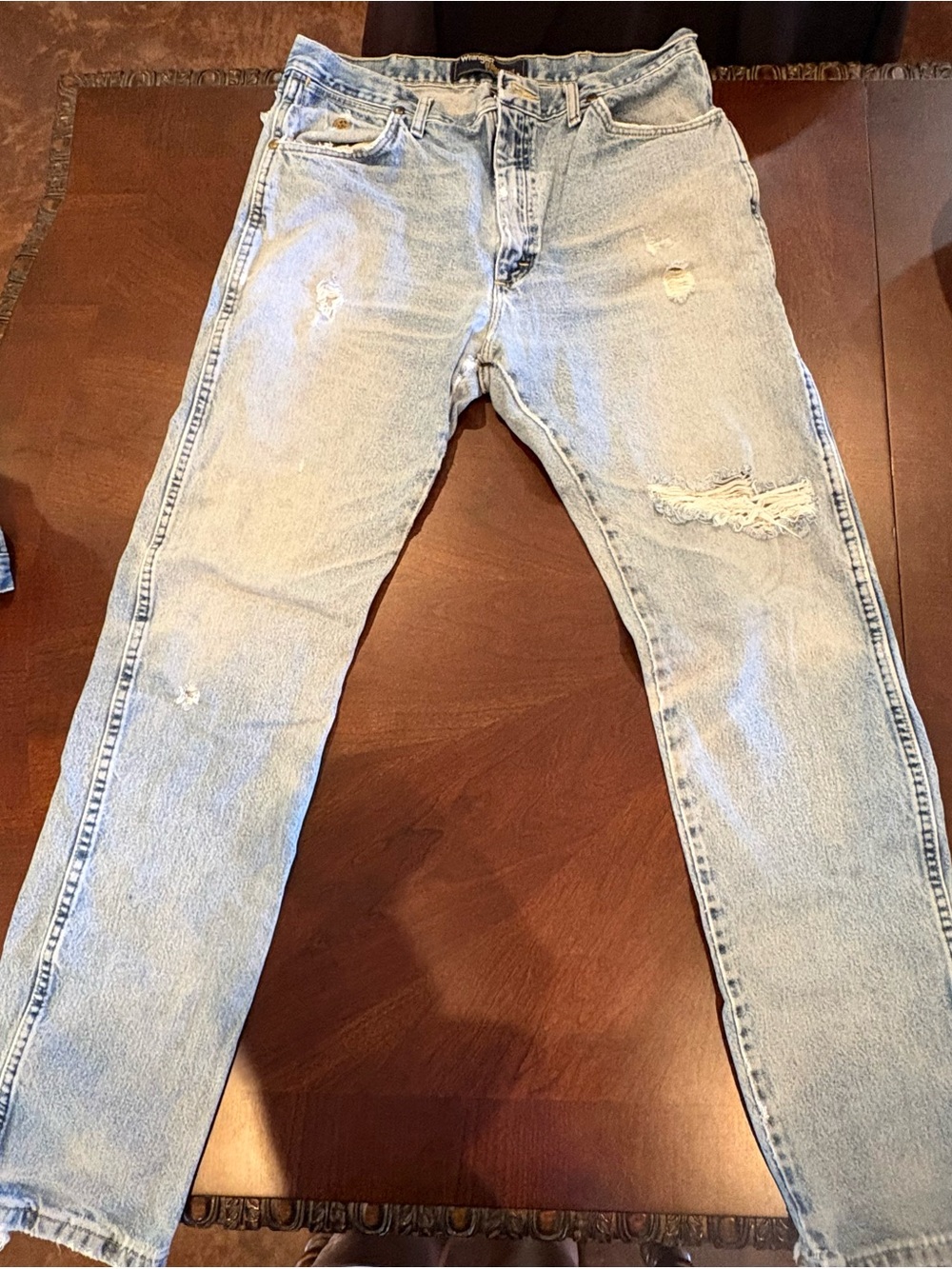 Wrangler men’s Light Blue Distressed Bootcut Jeans
